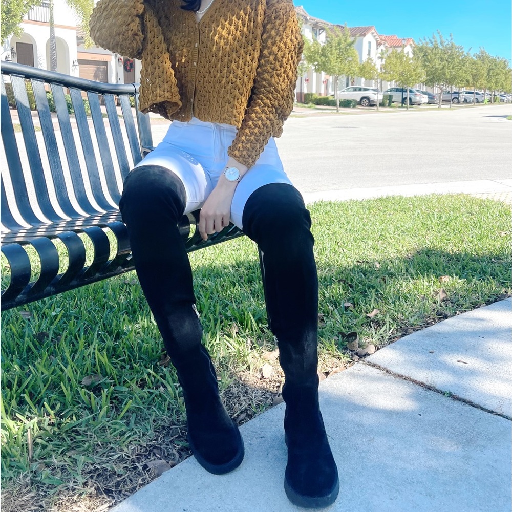 Over the knee black boots